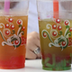 Bubble tea in plastic cups with straws